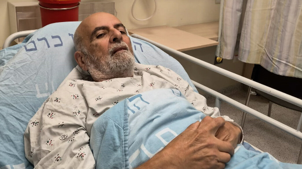 הסיר שלט הקורא לשחרור יגאל עמיר - והותקף הסיר שלט הקורא לשחרור יגאל עמיר - והותקף
