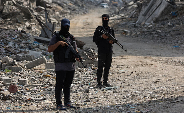 מחבלי הארגונים (צילום: OMAR AL-QATTAA/AFP via Getty Images)