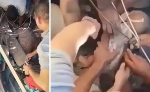 תינוק בן חצי שנה ואמו חולצו בחיים מההריסות בקאלי (צילום: מתוך הרשתות החברתיות לפי סעיף 27א' לחוק זכויות יוצרים)